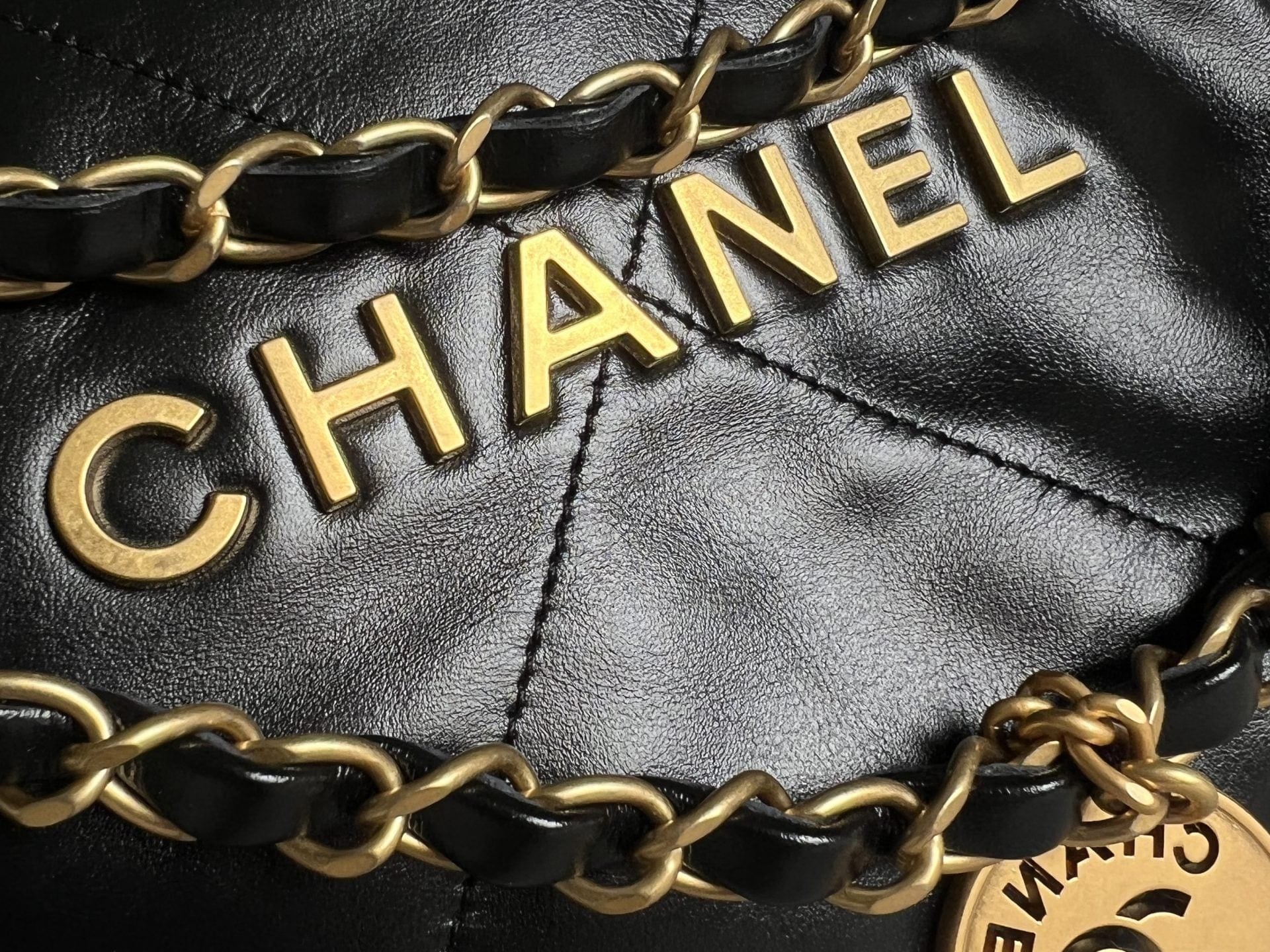CHANEL Handbag Chanel 22 Shiny Calfskin Quilted Drawstring Bag GHW - Redeluxe