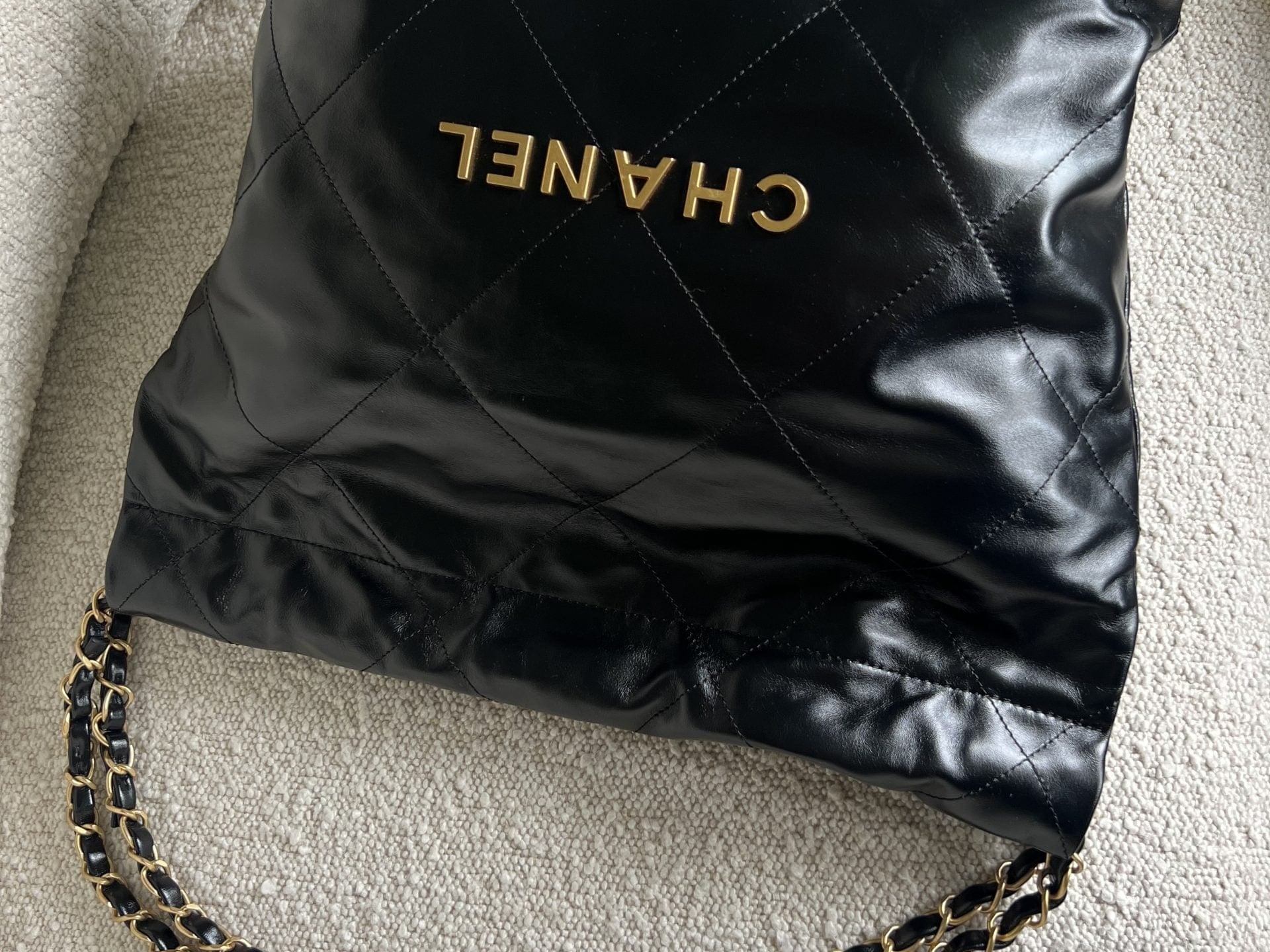 CHANEL Handbag Chanel 22 Shiny Calfskin Quilted Drawstring Bag GHW - Redeluxe