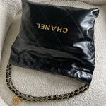 CHANEL Handbag Chanel 22 Shiny Calfskin Quilted Drawstring Bag GHW - Redeluxe