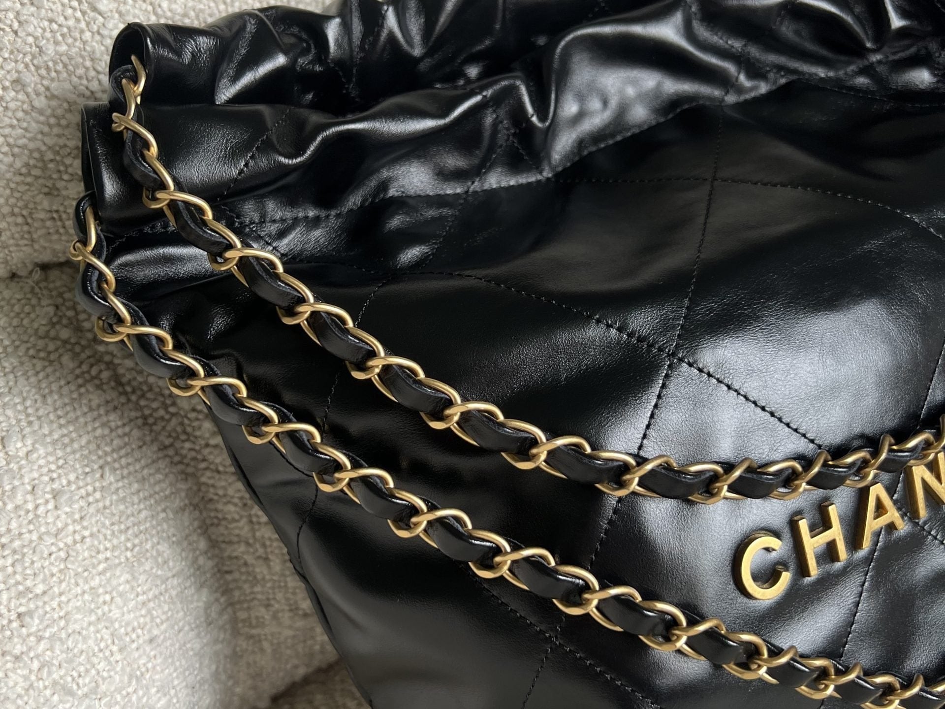 CHANEL Handbag Chanel 22 Shiny Calfskin Quilted Drawstring Bag GHW - Redeluxe