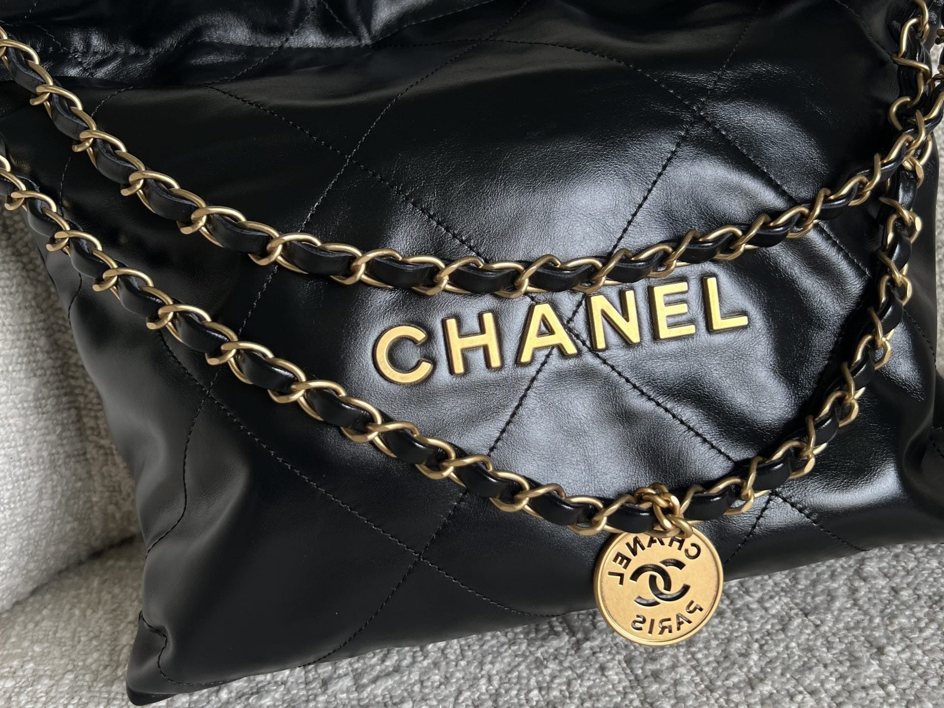CHANEL Handbag Chanel 22 Shiny Calfskin Quilted Drawstring Bag GHW - Redeluxe