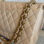 CHANEL Handbag Chanel Beige Clair Caviar Quilted Classic Flap  Medium GHW - Redeluxe