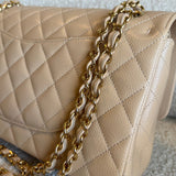 CHANEL Handbag Chanel Beige Clair Caviar Quilted Classic Flap  Medium GHW - Redeluxe