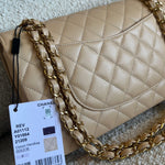 CHANEL Handbag Chanel Beige Clair Caviar Quilted Classic Flap  Medium GHW - Redeluxe