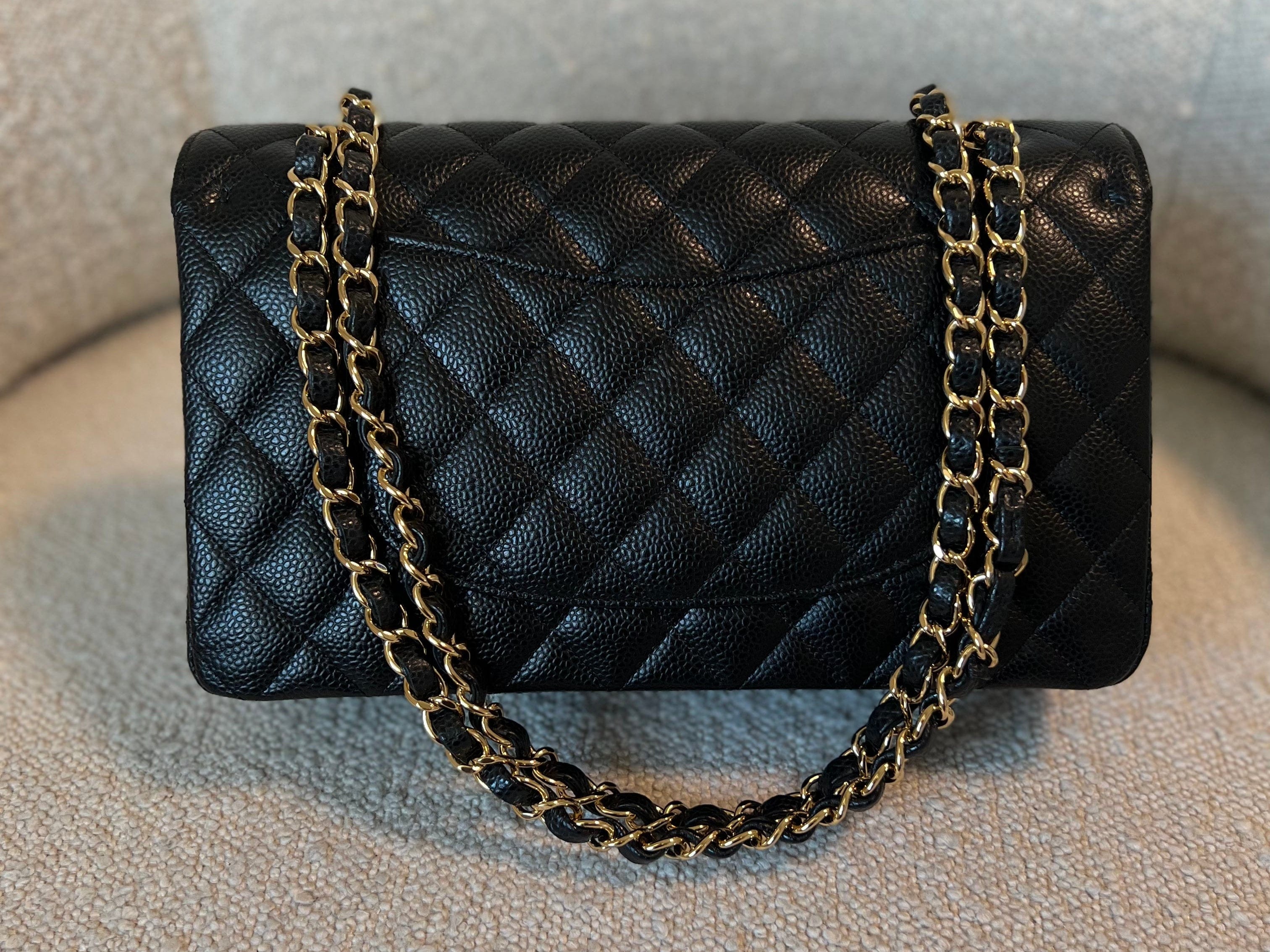 CHANEL Handbag Chanel Black Caviar Quilted Classic Double Flap Medium Gold Hardware - Redeluxe