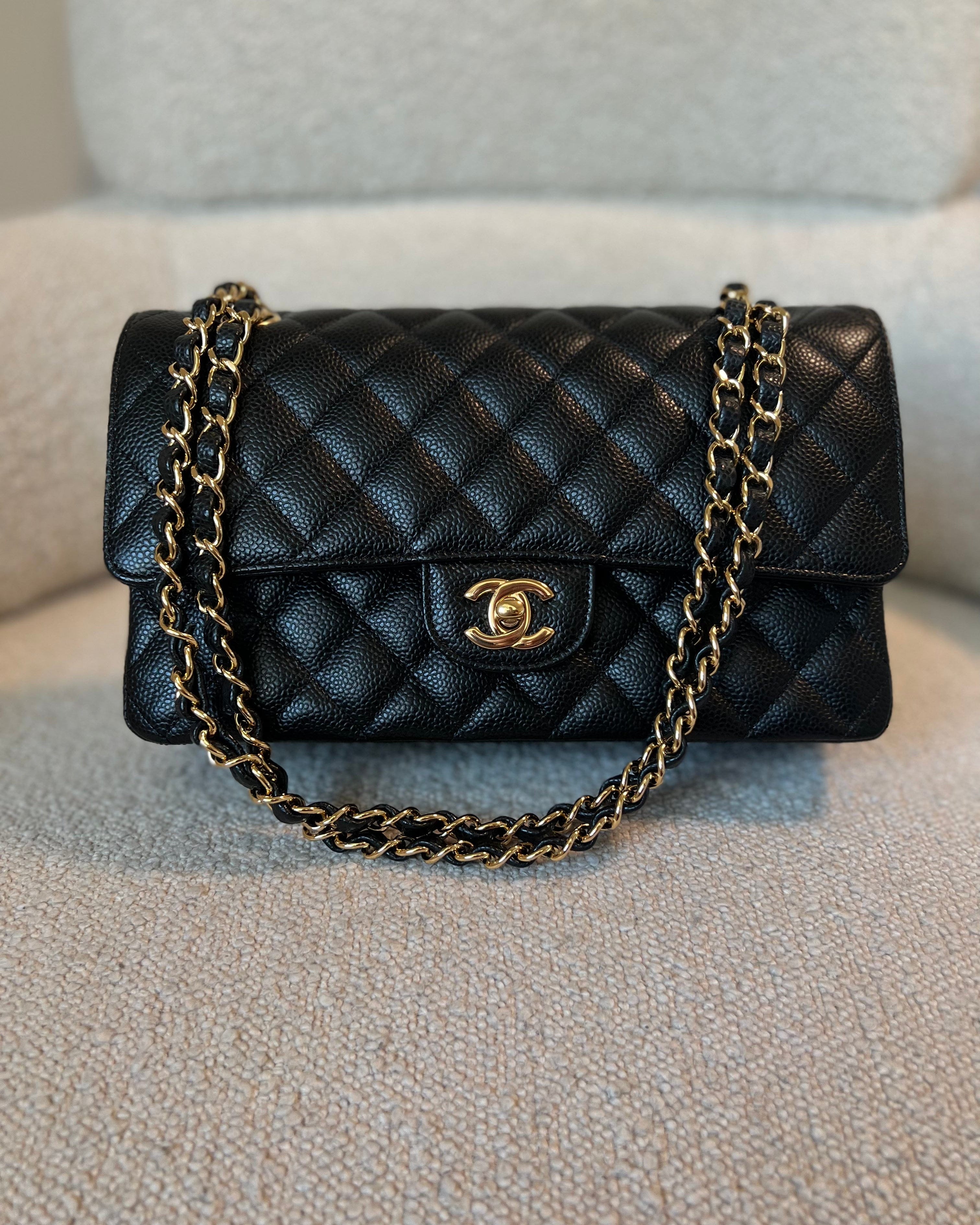 CHANEL Handbag Chanel Black Caviar Quilted Classic Double Flap Medium Gold Hardware - Redeluxe