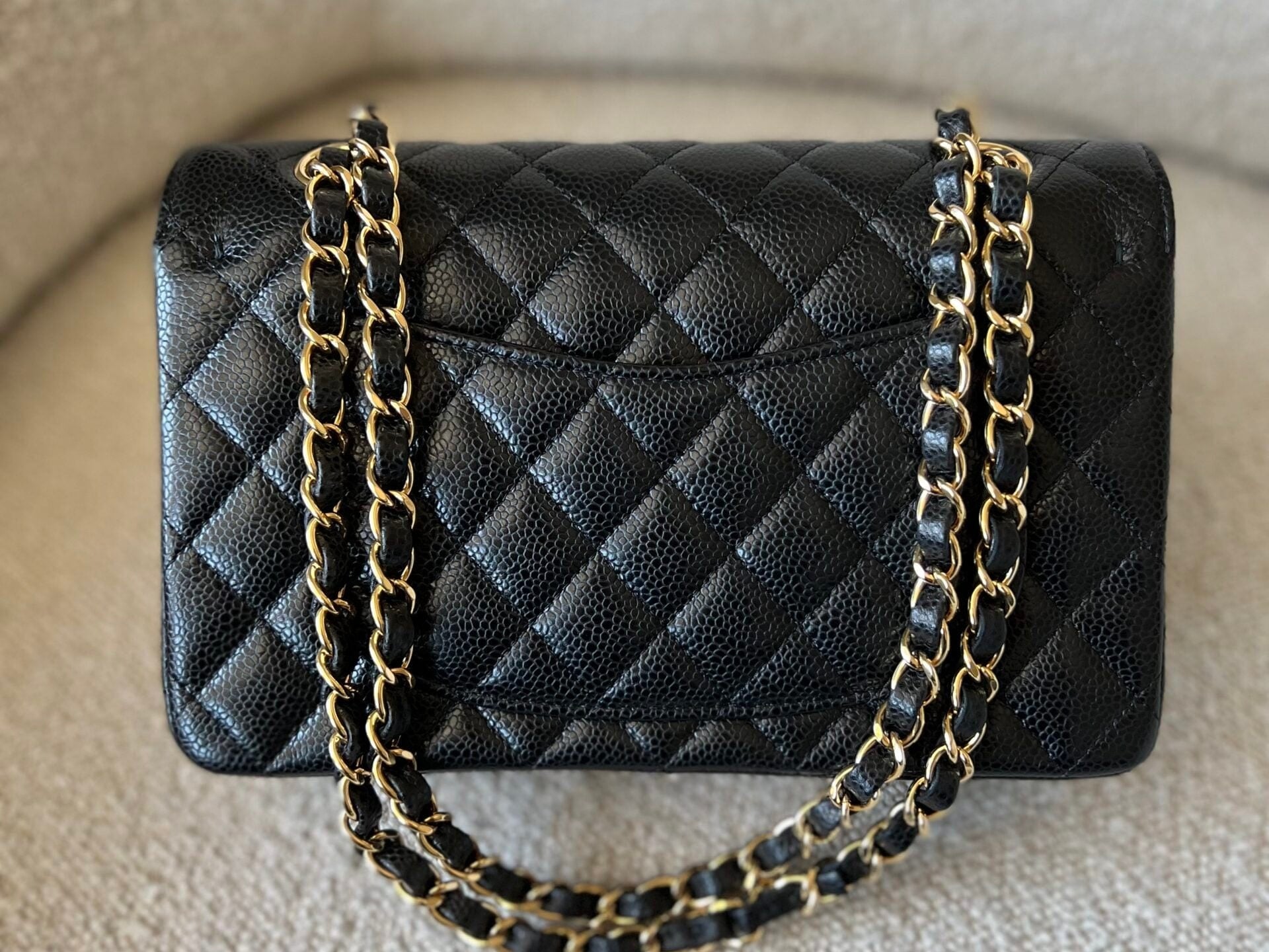 CHANEL Handbag Chanel Black Caviar Quilted Classic Flap Small Gold Hardware - Redeluxe