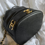 CHANEL Handbag Chanel Black Caviar Vintage Drawstring Gold Hardware - Redeluxe