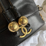 CHANEL Handbag Chanel Black Caviar Vintage Drawstring Gold Hardware - Redeluxe