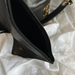 CHANEL Handbag Chanel Black Caviar Vintage Drawstring Gold Hardware - Redeluxe