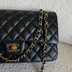 CHANEL Handbag Chanel Black Lambskin Quilted Classic Flap Medium GHW - Redeluxe