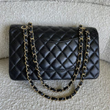 CHANEL Handbag Chanel Black Lambskin Quilted Classic Flap Medium GHW - Redeluxe