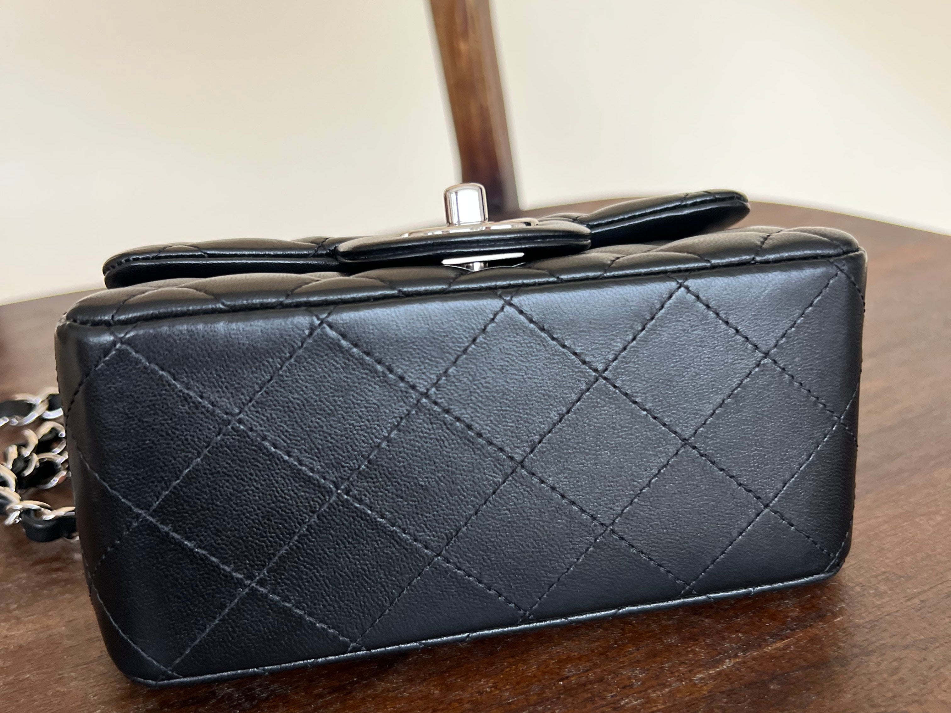CHANEL Handbag CHANEL BLACK MINI SQUARE LAMBSKIN QUILTED FLAP SILVER HARDWARE - Redeluxe