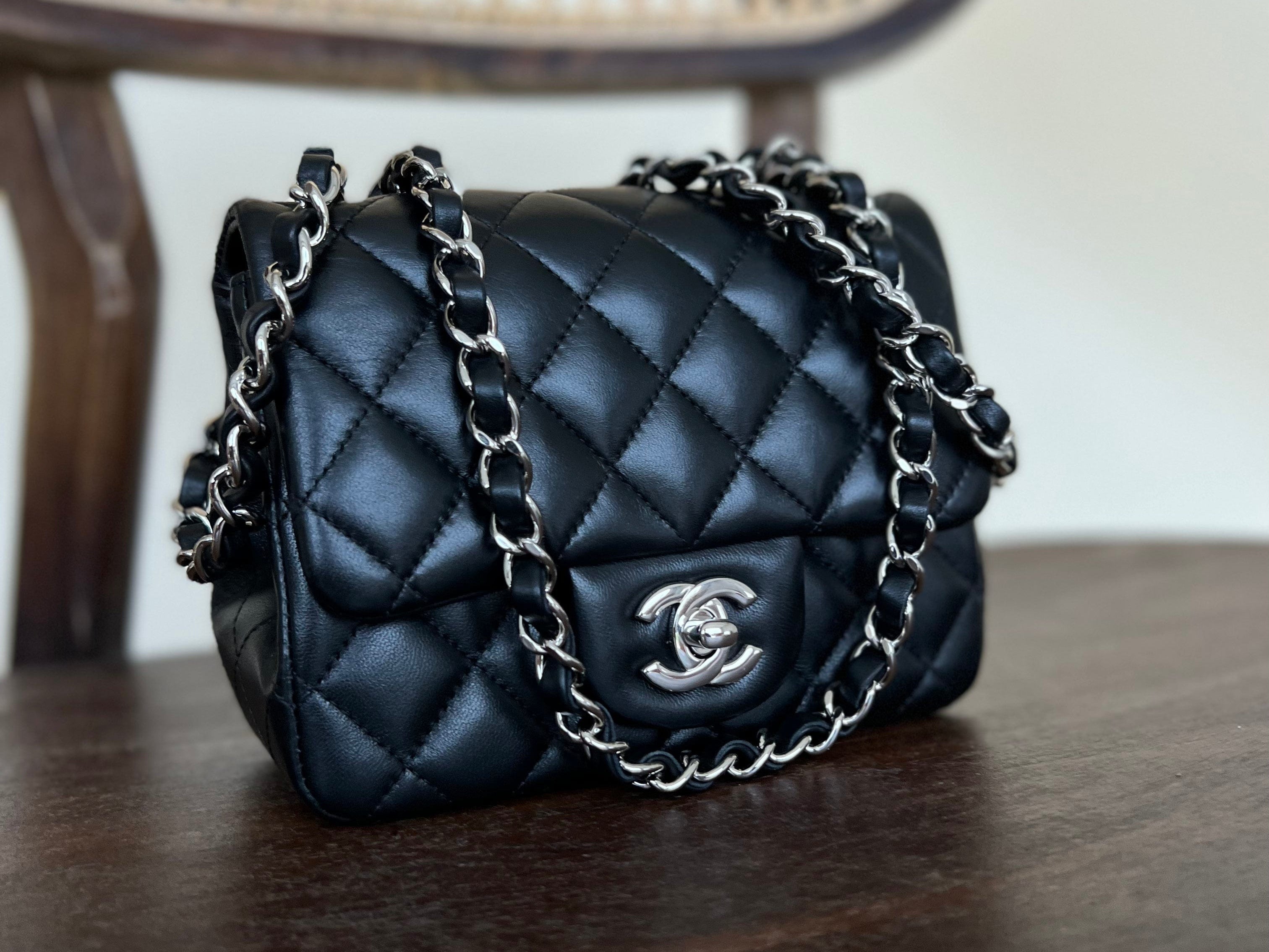 Black chanel bag with silver chain hotsell