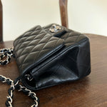 CHANEL Handbag CHANEL BLACK MINI SQUARE LAMBSKIN QUILTED FLAP SILVER HARDWARE - Redeluxe