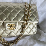 CHANEL Handbag Chanel Metallic Gold Lambskin Quilted Classic Flap Medium AGHW - Redeluxe