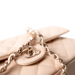CHANEL Handbag Classic Flap / Beige 22c Beige Caviar Quilted Classic Flap Medium Light Gold Hardware - Redeluxe