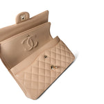CHANEL Handbag Classic flap / Beige Beige / Tan Caviar Quilted Classic Flap Medium Light Gold Hardware - Redeluxe