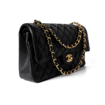 CHANEL Handbag Classic Flap / Black Black Caviar Quilted Classic Flap Medium Gold Hardware - Redeluxe