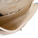 CHANEL Handbag Cream 20C Light Beige Caviar Quilted Classic Flap Medium Light Gold Hardware - Redeluxe