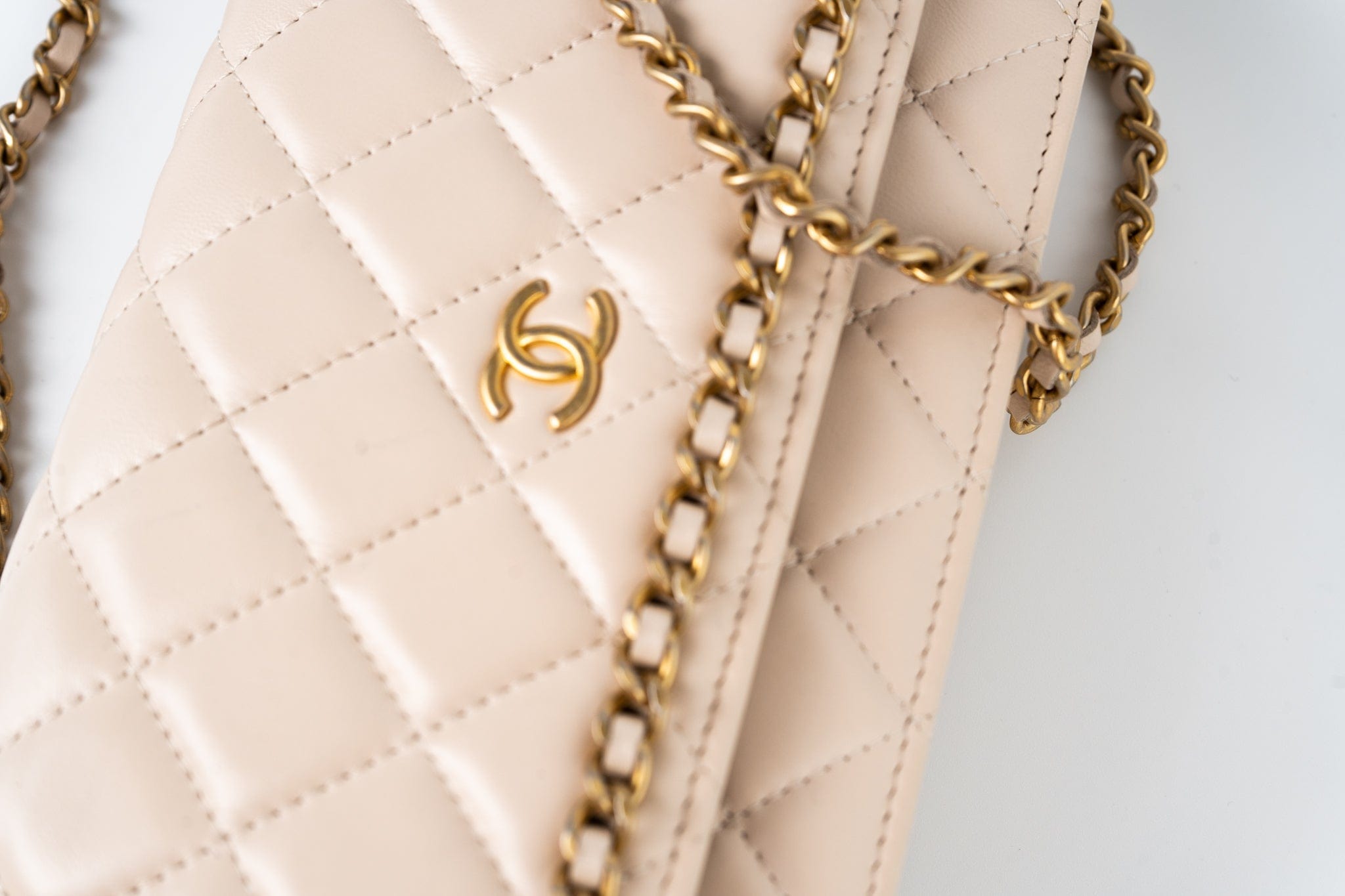 CHANEL Handbag Cream Nude/ Ecru Lambskin Quilted Chain Around Wallet On Chain WOC Aged Gold Hardware - Redeluxe