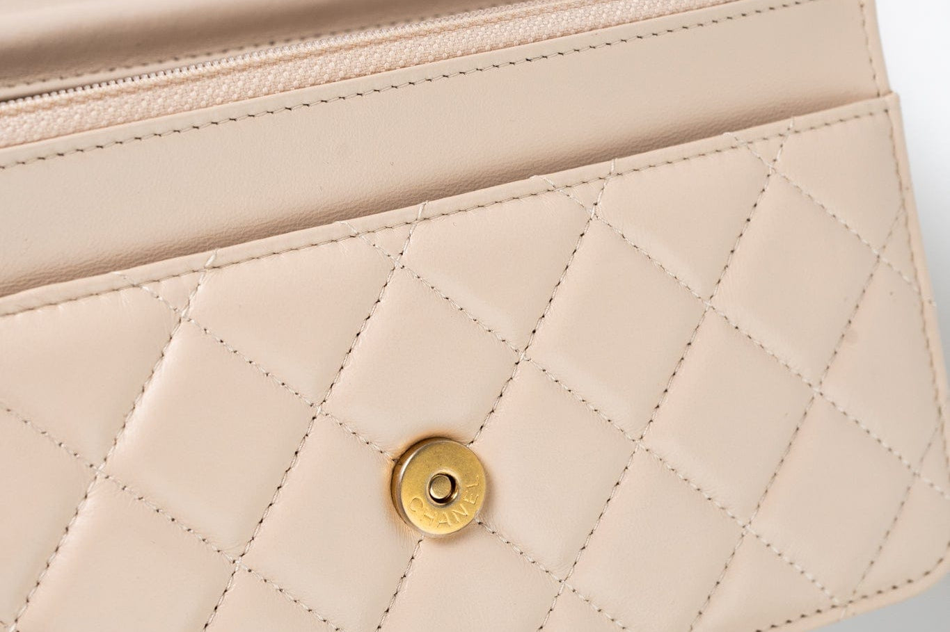 CHANEL Handbag Cream Nude/ Ecru Lambskin Quilted Chain Around Wallet On Chain WOC Aged Gold Hardware - Redeluxe