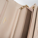 CHANEL Handbag Cream Nude/ Ecru Lambskin Quilted Chain Around Wallet On Chain WOC Aged Gold Hardware - Redeluxe