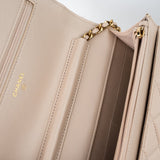 CHANEL Handbag Cream Nude/ Ecru Lambskin Quilted Chain Around Wallet On Chain WOC Aged Gold Hardware - Redeluxe