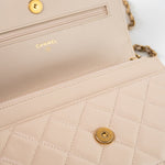 CHANEL Handbag Cream Nude/ Ecru Lambskin Quilted Chain Around Wallet On Chain WOC Aged Gold Hardware - Redeluxe