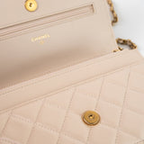 CHANEL Handbag Cream Nude/ Ecru Lambskin Quilted Chain Around Wallet On Chain WOC Aged Gold Hardware - Redeluxe