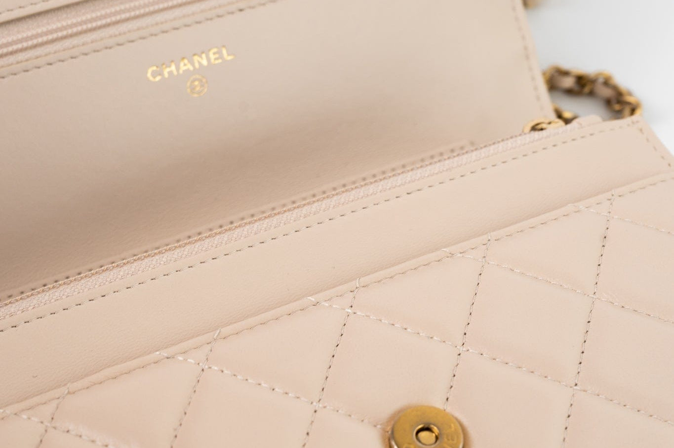 CHANEL Handbag Cream Nude/ Ecru Lambskin Quilted Chain Around Wallet On Chain WOC Aged Gold Hardware - Redeluxe