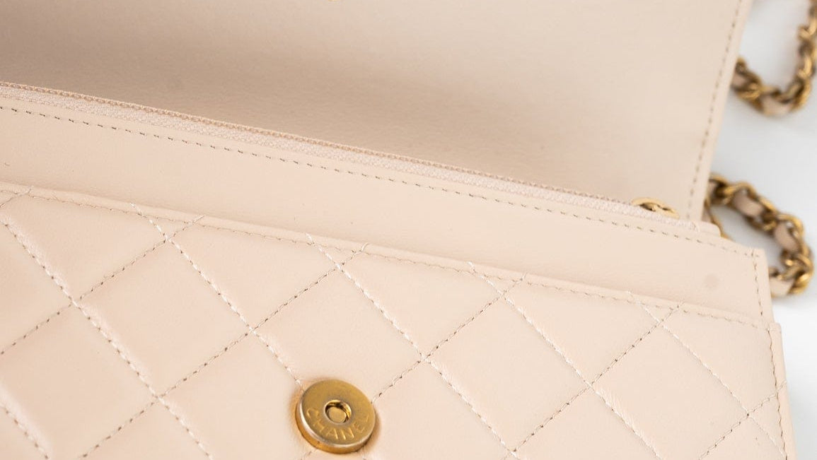 CHANEL Handbag Cream Nude/ Ecru Lambskin Quilted Chain Around Wallet On Chain WOC Aged Gold Hardware - Redeluxe