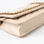 CHANEL Handbag Cream Nude/ Ecru Lambskin Quilted Chain Around Wallet On Chain WOC Aged Gold Hardware - Redeluxe