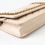 CHANEL Handbag Cream Nude/ Ecru Lambskin Quilted Chain Around Wallet On Chain WOC Aged Gold Hardware - Redeluxe