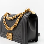 CHANEL Handbag Dark Grey Boy Bag Old Medium Caviar Quilted w/ Aged Gold Hardware - Redeluxe