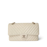 CHANEL Handbag Ivory / Classic flap 18C Ivory Chevron Lambskin Medium Classic Flap Light Gold Hardware - Redeluxe