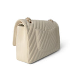 CHANEL Handbag Ivory / Classic flap 18C Ivory Chevron Lambskin Medium Classic Flap Light Gold Hardware - Redeluxe