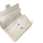 CHANEL Handbag Ivory / Classic flap 18C Ivory Chevron Lambskin Medium Classic Flap Light Gold Hardware - Redeluxe