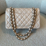CHANEL Handbag Light Beige Lambskin Quilted Classic Double Flap Small Light Gold Hardware - Redeluxe