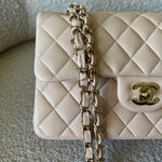 CHANEL Handbag Light Beige Lambskin Quilted Classic Double Flap Small Light Gold Hardware - Redeluxe