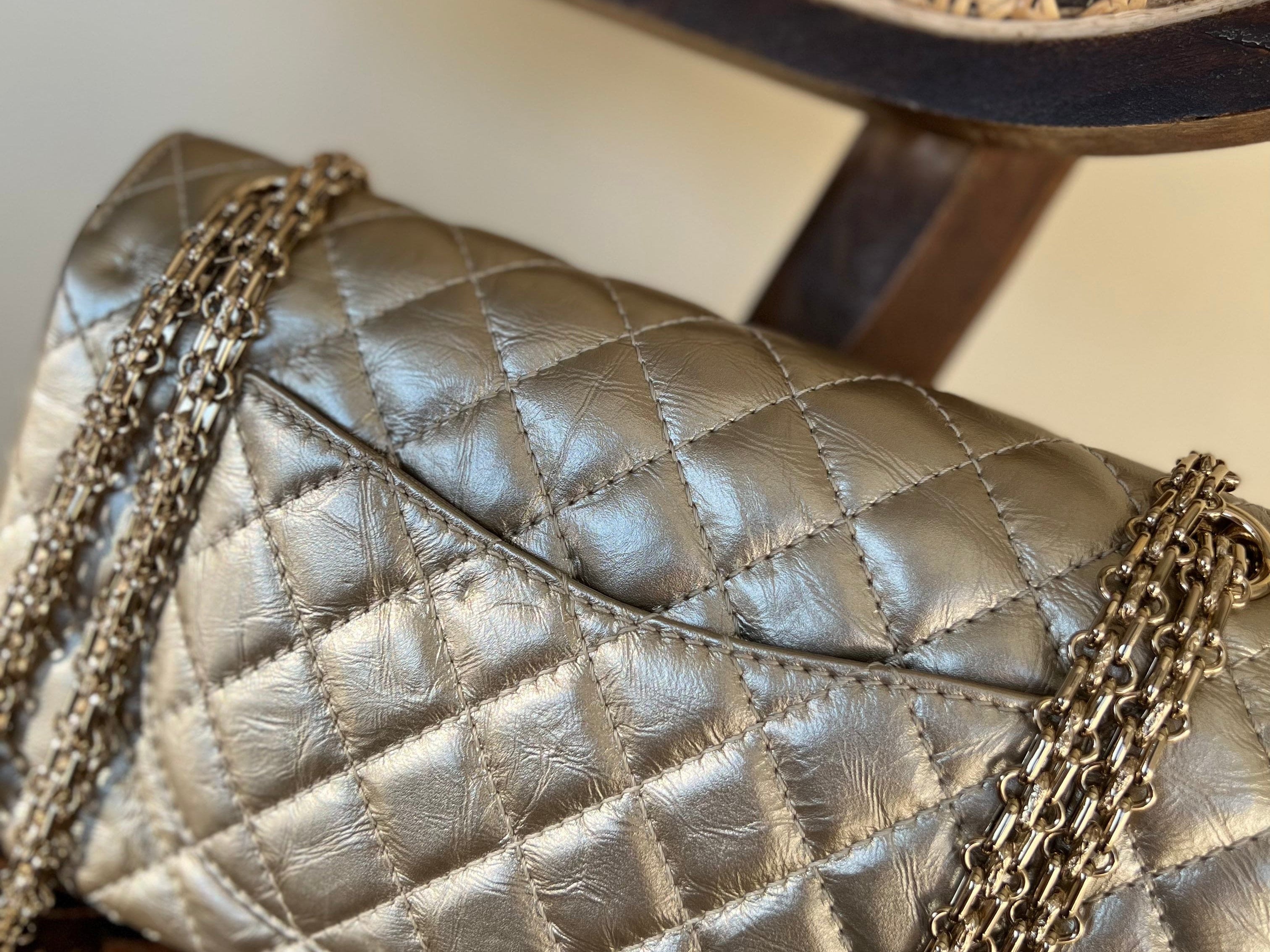 CHANEL Handbag Light Metallic Gold Aged Calfskin Quilted Small Reissue 2.55 - Redeluxe