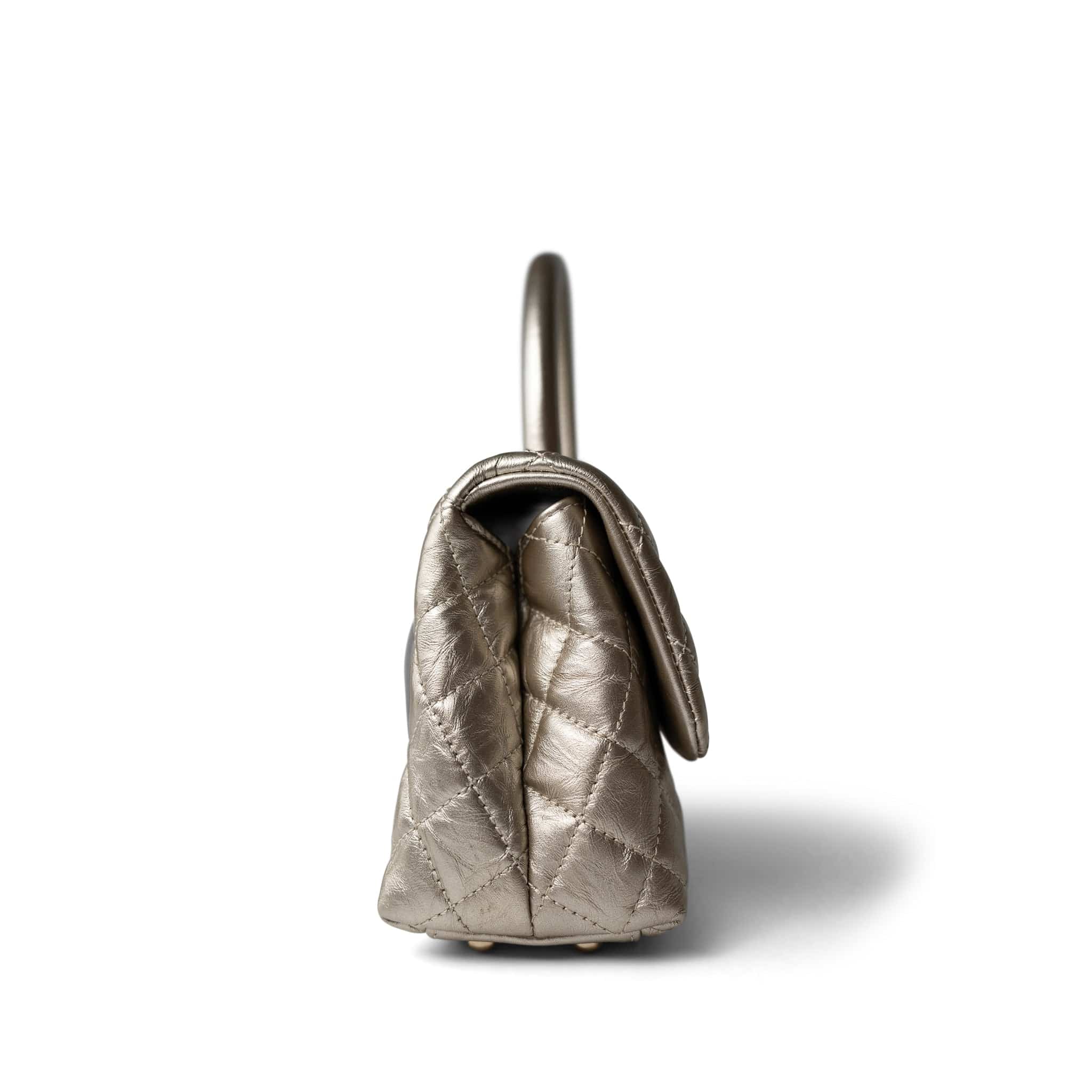 CHANEL Handbag Metallic 20A Metallic Aged Calfskin Quilted Mini Coco Handle Light Gold Hardware - Redeluxe