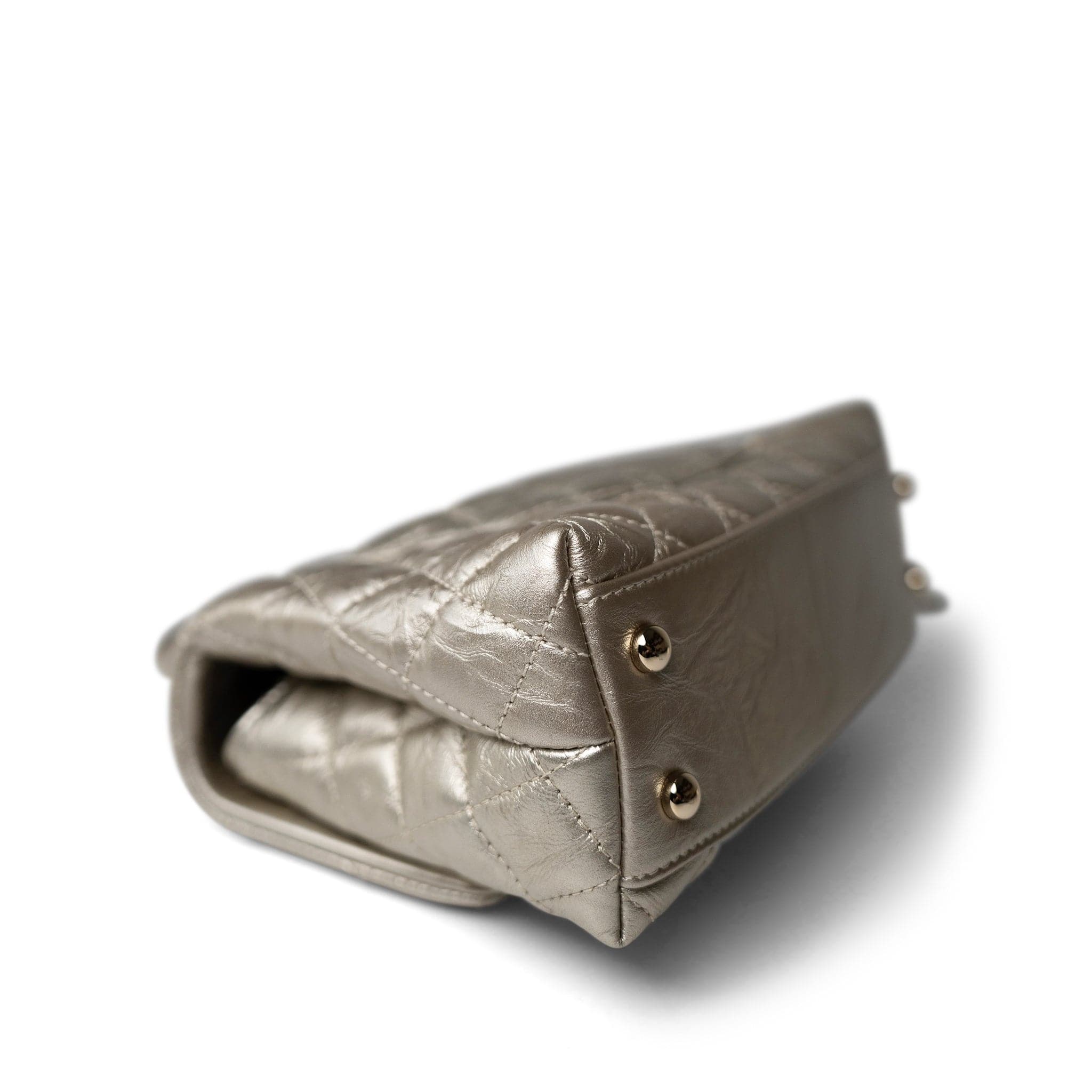 CHANEL Handbag Metallic 20A Metallic Aged Calfskin Quilted Mini Coco Handle Light Gold Hardware - Redeluxe