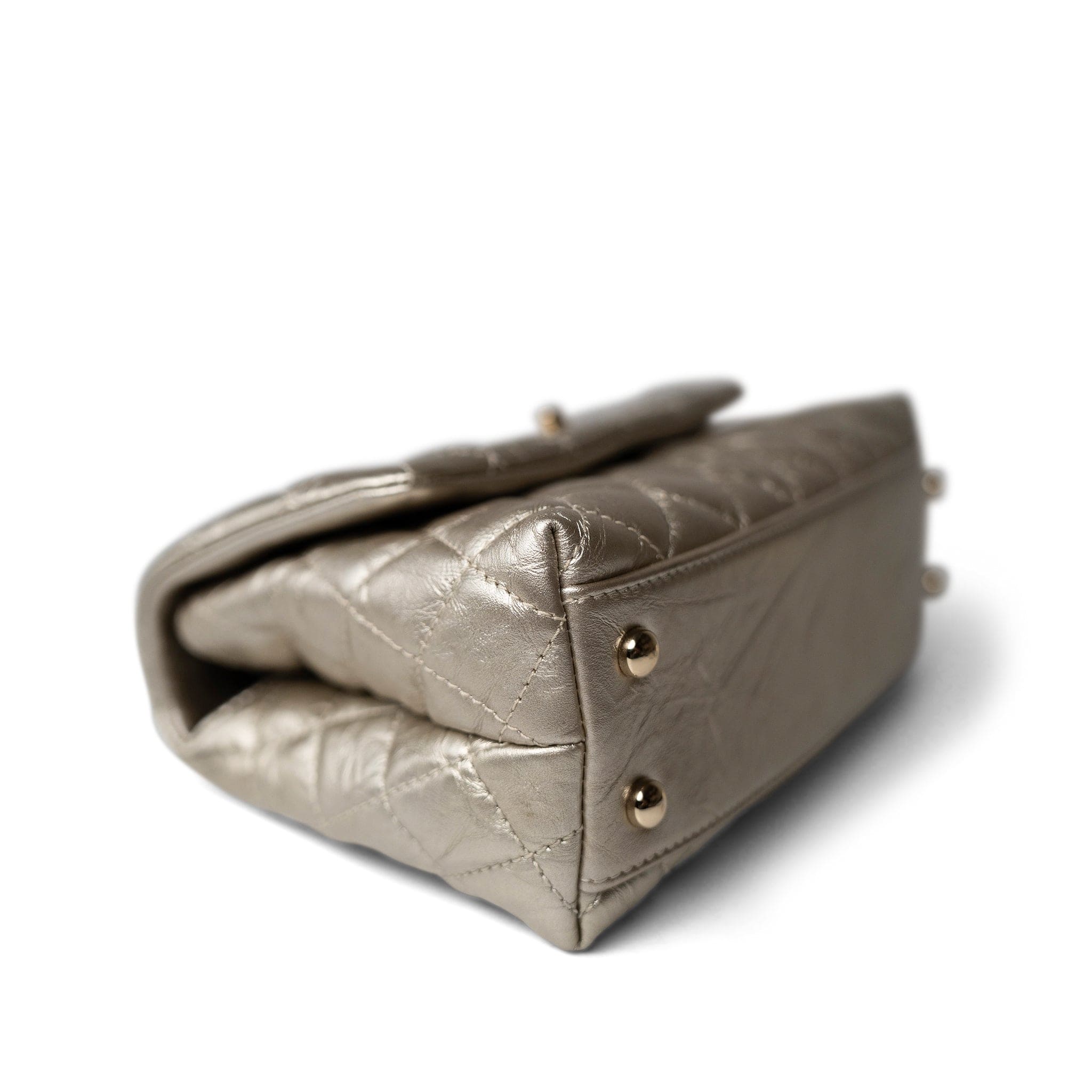 CHANEL Handbag Metallic 20A Metallic Aged Calfskin Quilted Mini Coco Handle Light Gold Hardware - Redeluxe