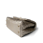 CHANEL Handbag Metallic 20A Metallic Aged Calfskin Quilted Mini Coco Handle Light Gold Hardware - Redeluxe