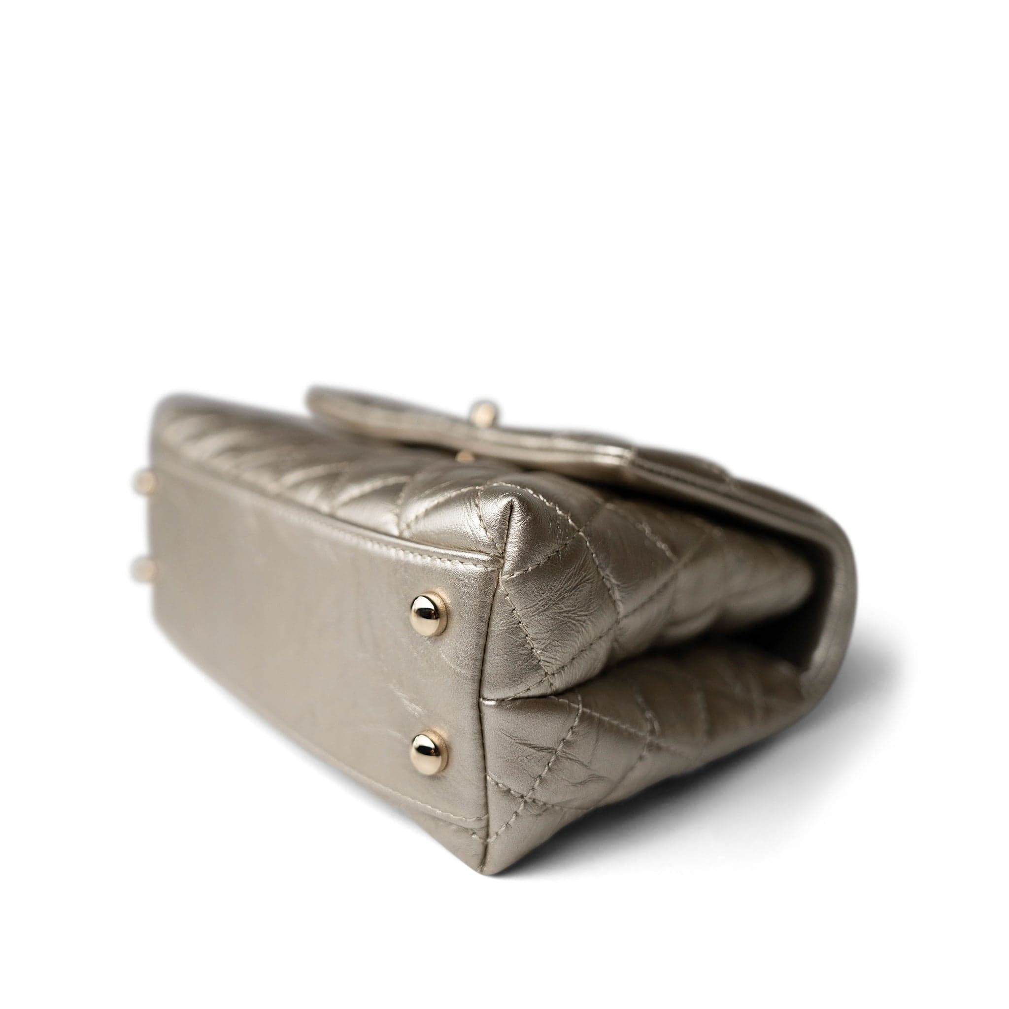 CHANEL Handbag Metallic 20A Metallic Aged Calfskin Quilted Mini Coco Handle Light Gold Hardware - Redeluxe
