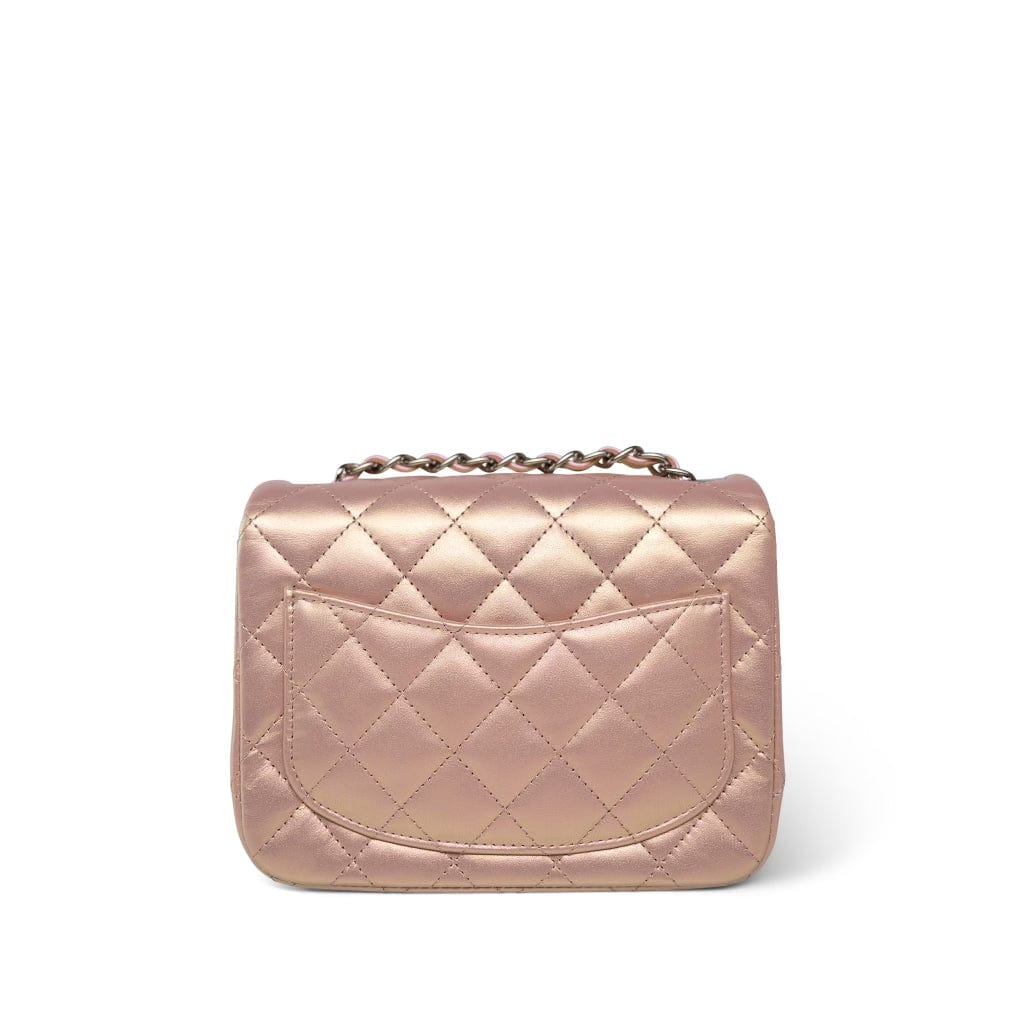 CHANEL Handbag Pink 21K Mini Pink Iridescent Square Lambskin Quilted Classic Flap SHW - Redeluxe