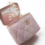 CHANEL Handbag Pink Light Pink Lambskin Quilted Mini Vanity Case With Pearl Chain - Redeluxe