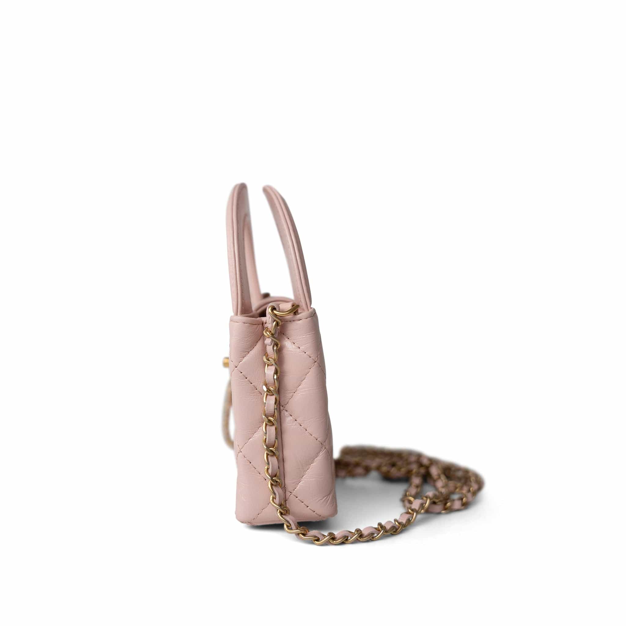 CHANEL Handbag Pink Light Pink Shiny Aged Calfskin Nano Kelly Mini Shopper - Redeluxe