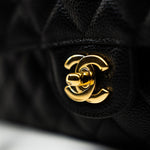 CHANEL Handbag (Rev) Medium Black Caviar Quilted Classic Flap Gold Hardware - Redeluxe